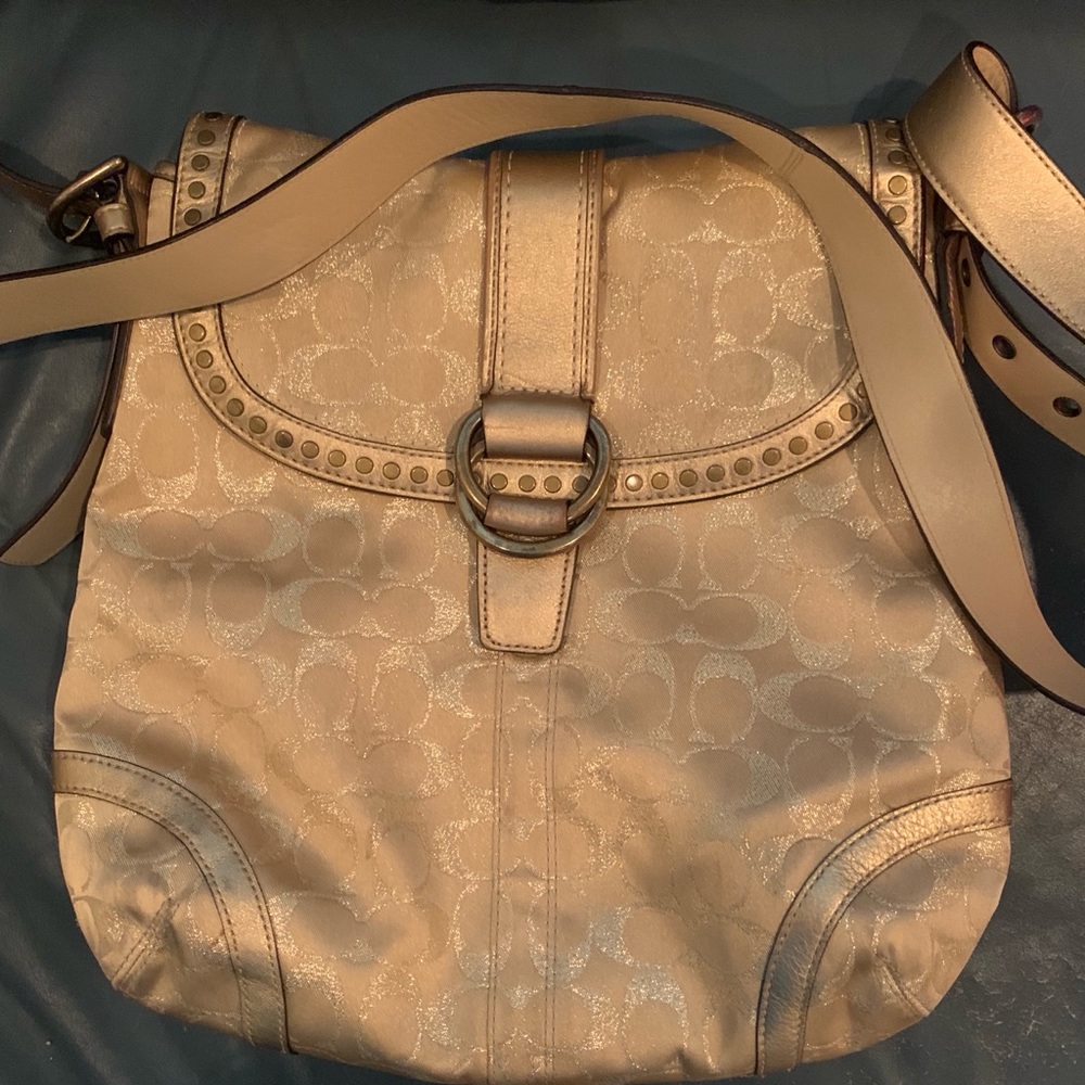 Coach gold motif shoulder bag